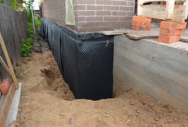 SJ Waterproofing Pros technician performing targeted Foundation Crack Repair assessment in Jefferson, OH